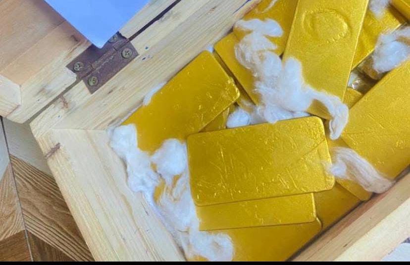 Gold bars packed in a wooden box