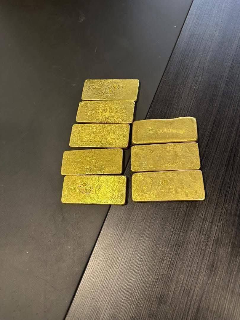 Gold bars arranged on a table